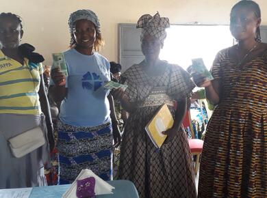 4 africa women proudly display certificates