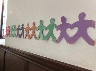 paper cut outs on wall